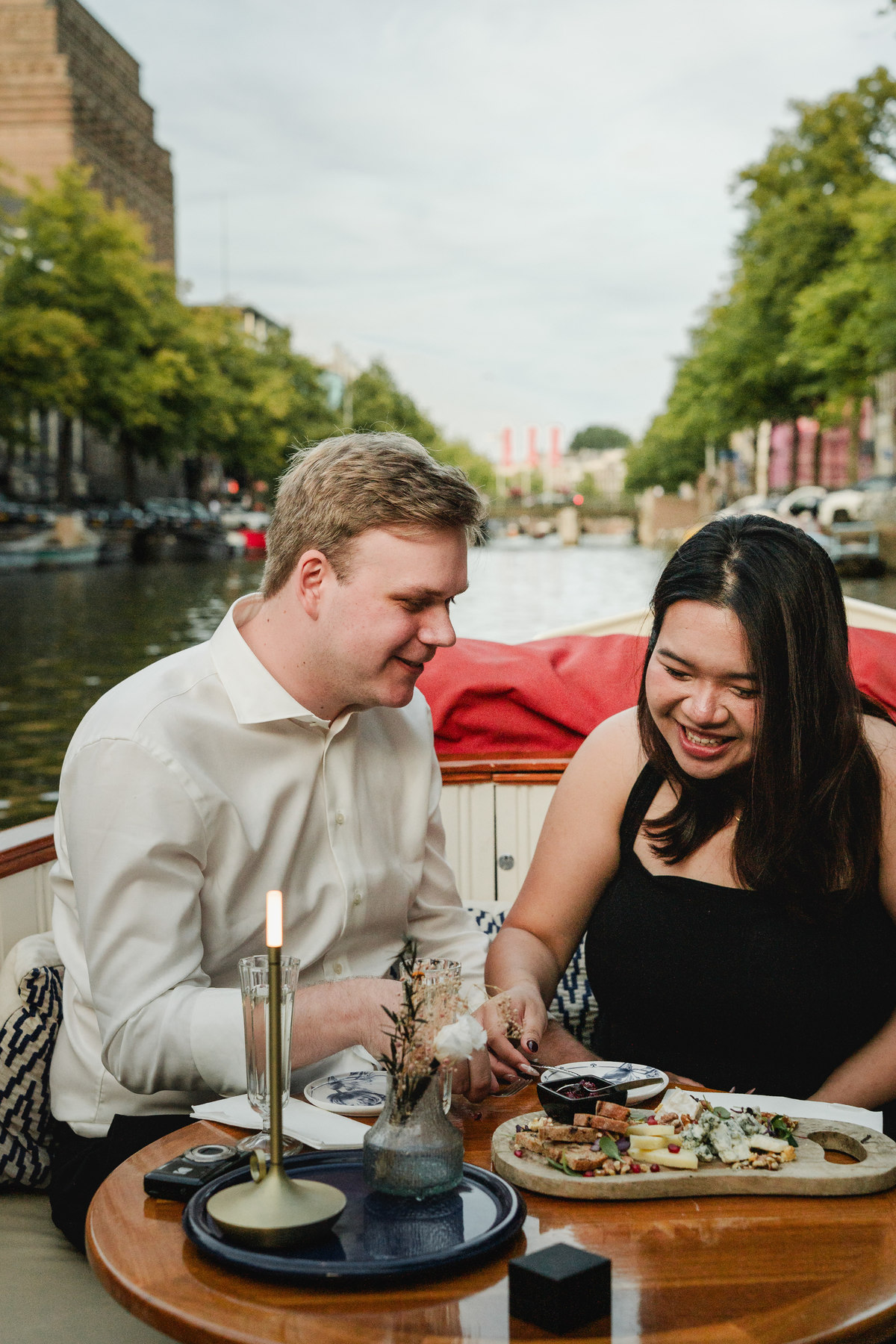 Engagement portraits aboard a private Amsterdam canal boat