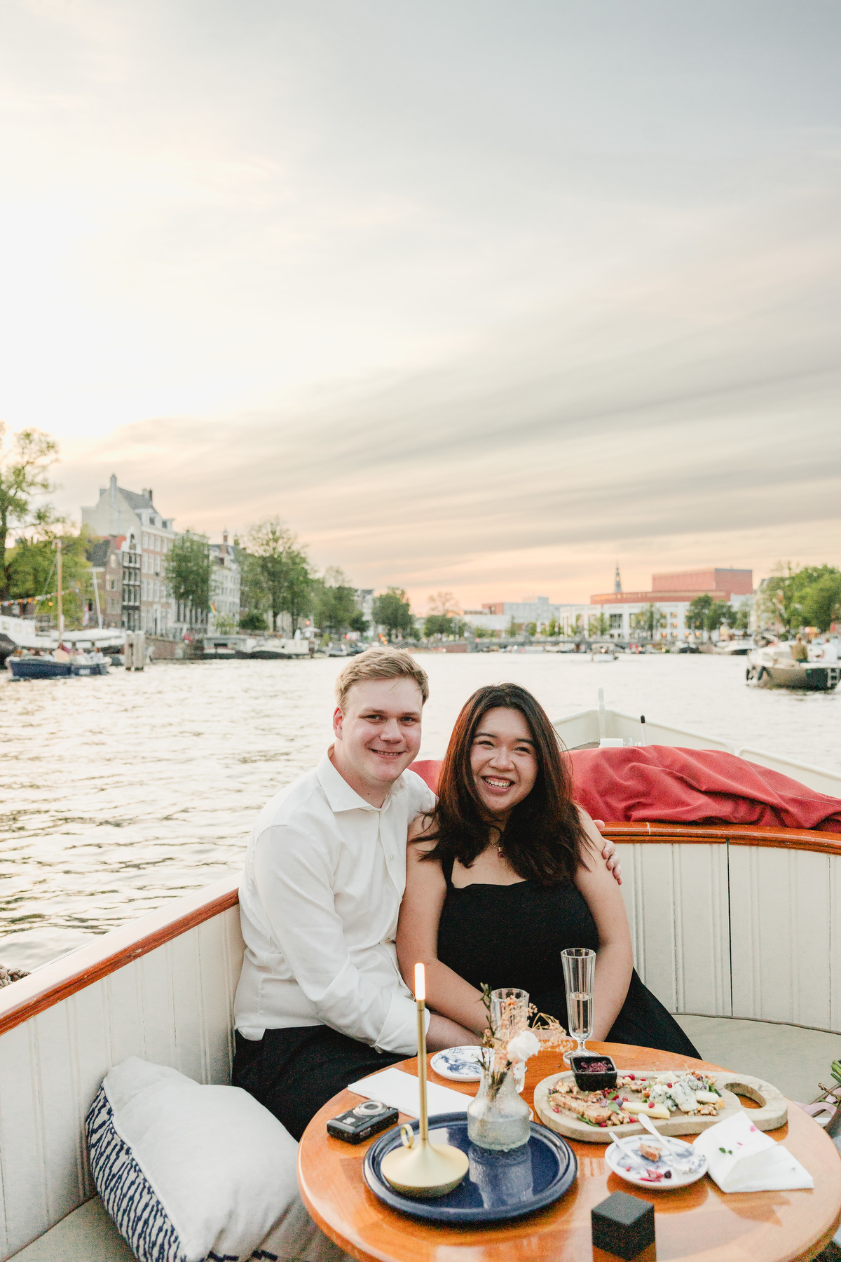 Engagement portraits aboard a private Amsterdam canal boat