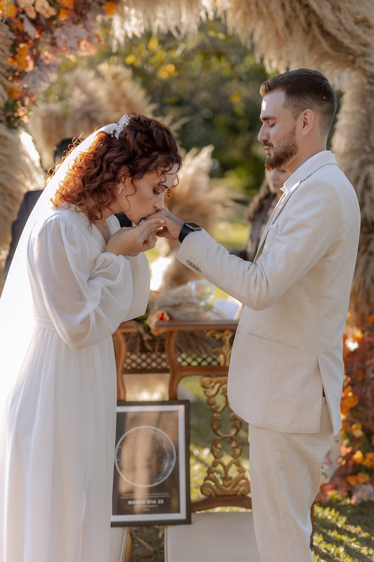 Troca de alianças dos noivos 