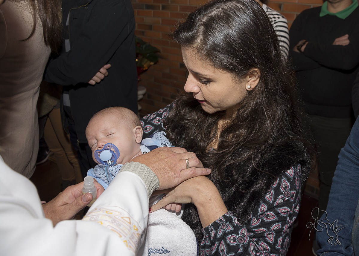 Momento do batizado que Eli Matos Fotografia registra