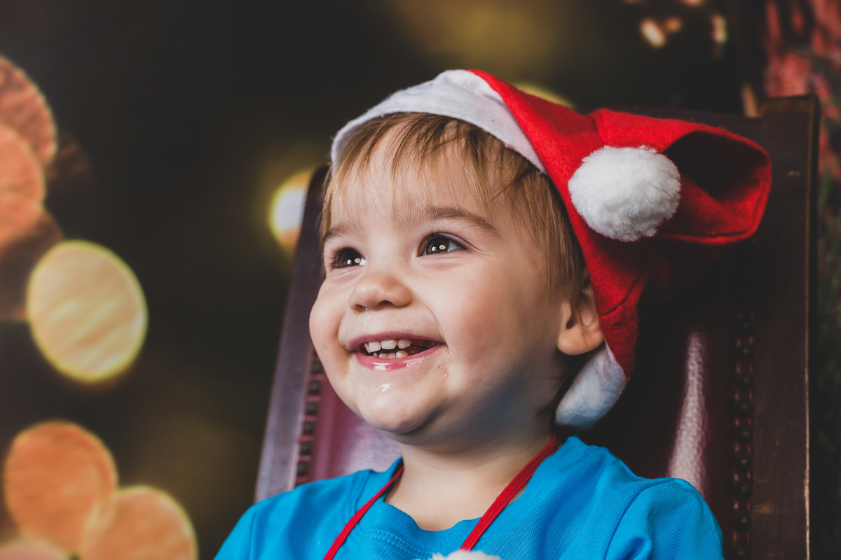 criança na sessão de natal