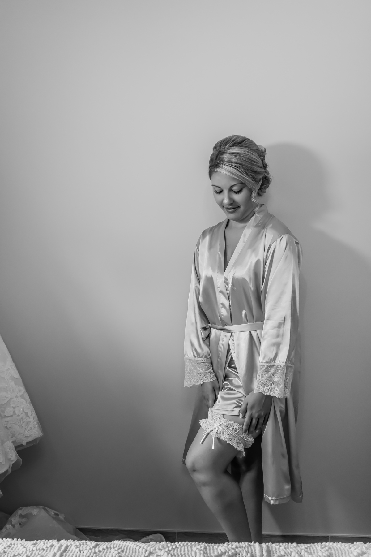 Noiva Andreia a vestir a liga 