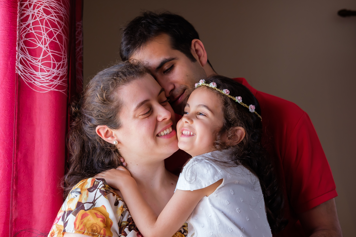 Valentina com os pais