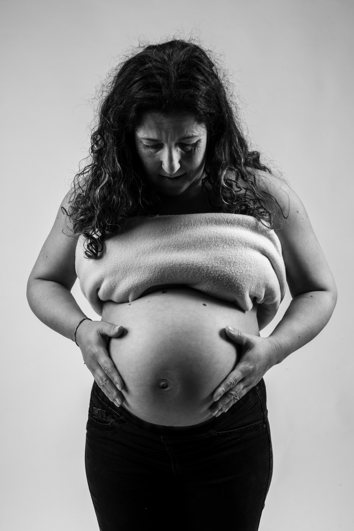 Barriga de grávida na sessão fotográfica