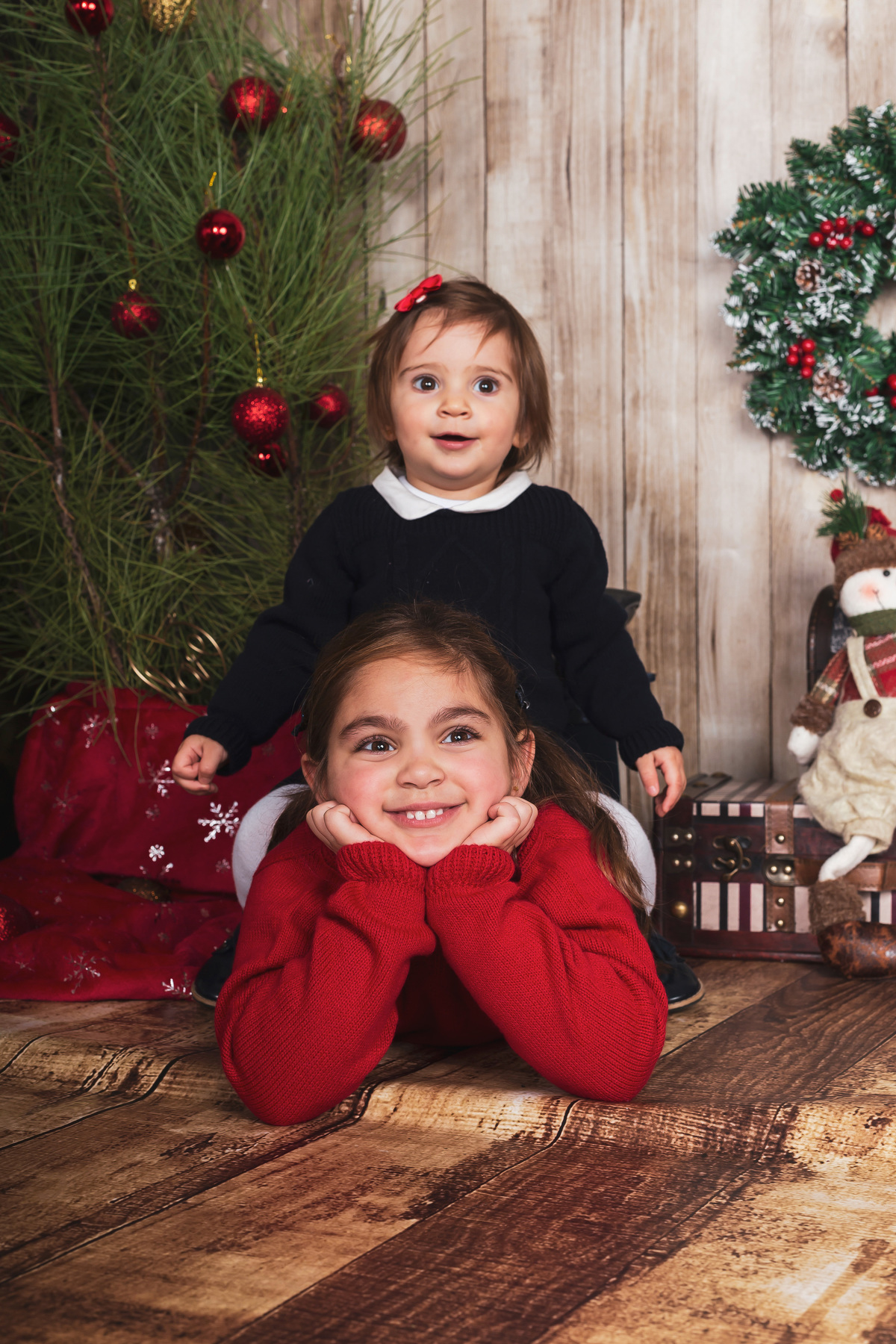 Sessão fotográfica de natal das irmãs