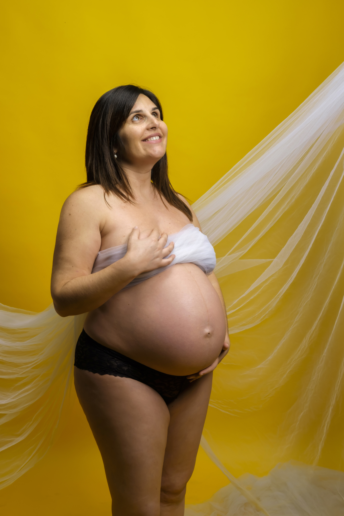 Mãe grávida com a família