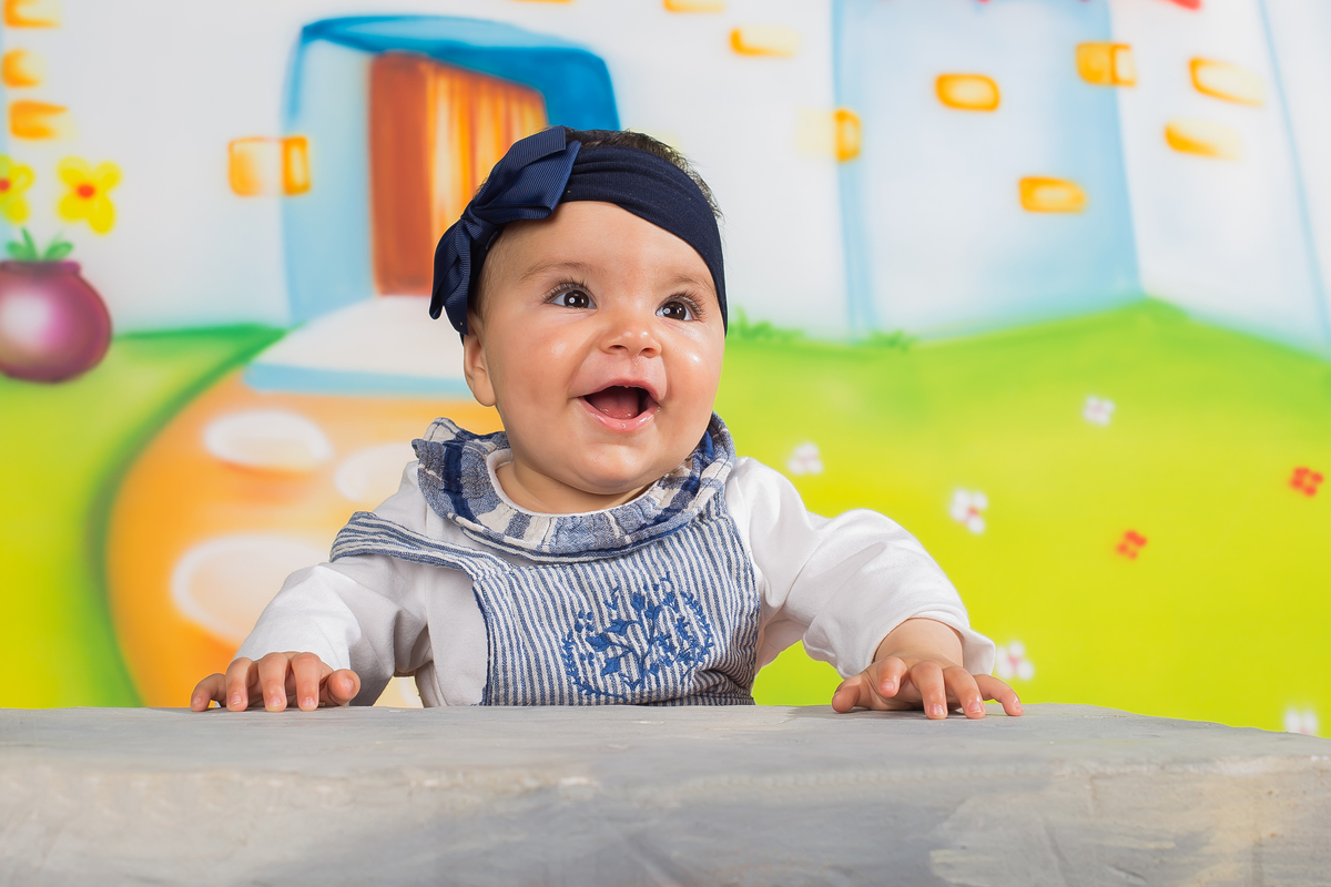 Sessão fotográfica da bebé de sete meses