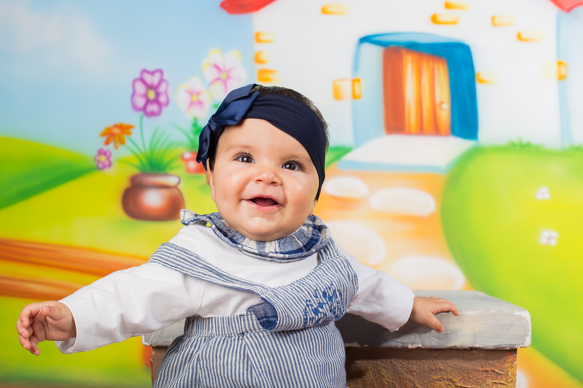 Menina de sete meses na sessão de estúdio