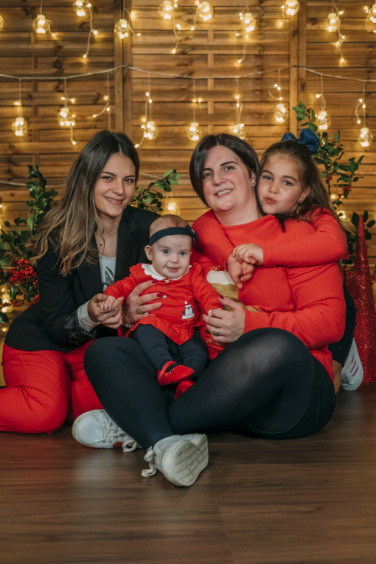 Mãe e as suas filhas na sessão fotográfica