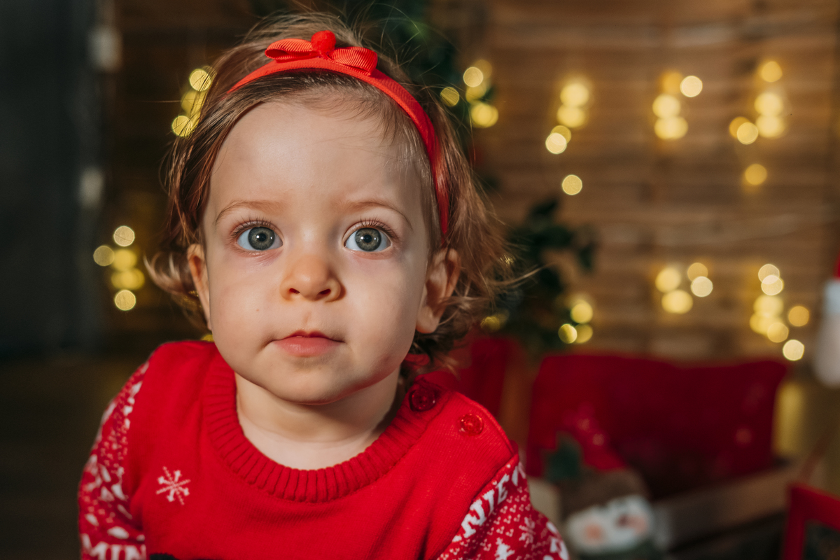 Menina na sessão de natal