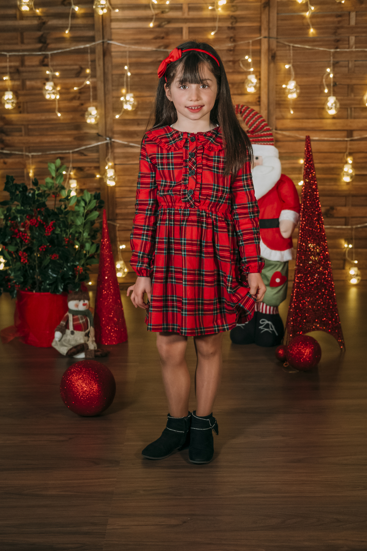Menina na sessão fotográfica de Natal 