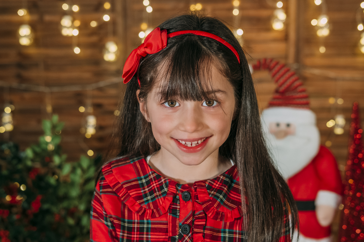 Menina na sessão fotográfica de Natal  em Vale de Cambra