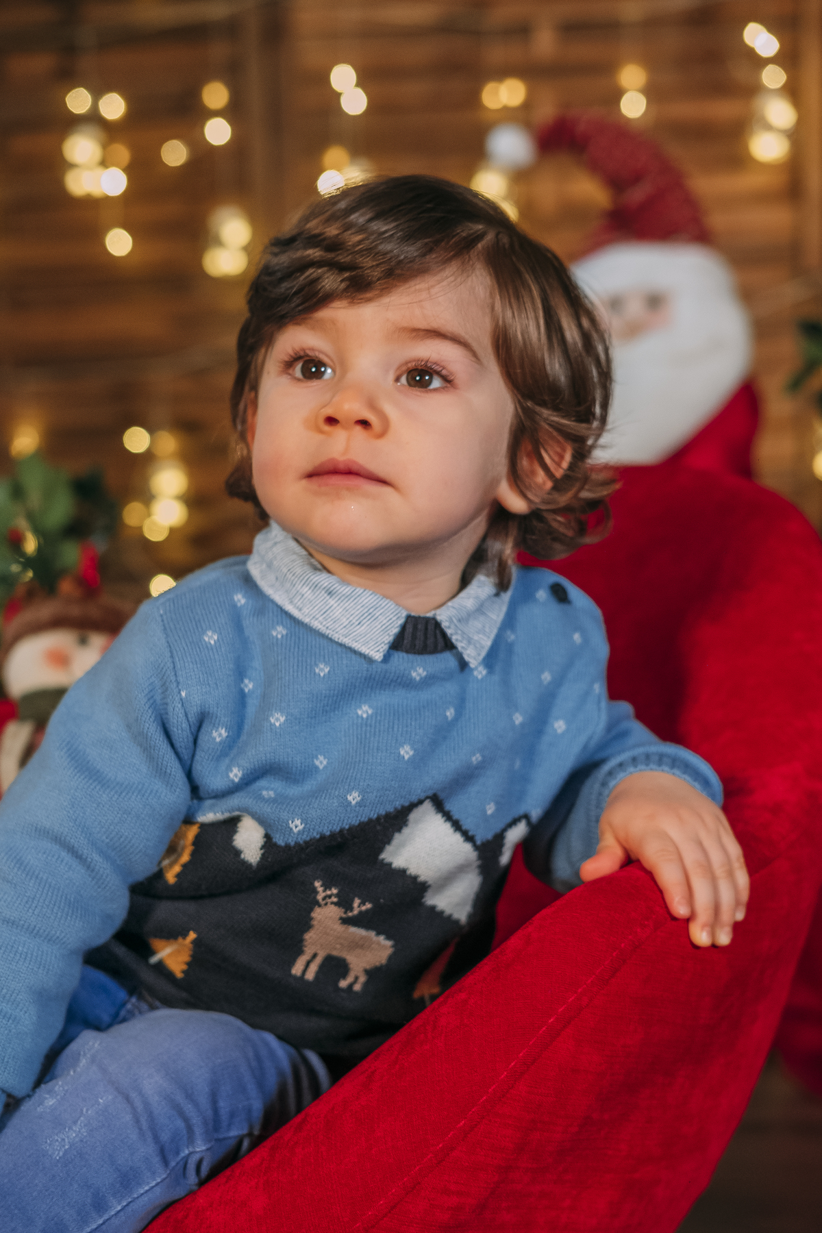 Menino na sessão de Natal