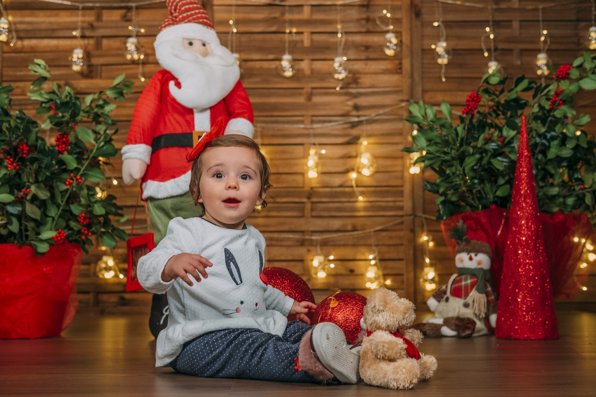 Menina na sessão de Natal