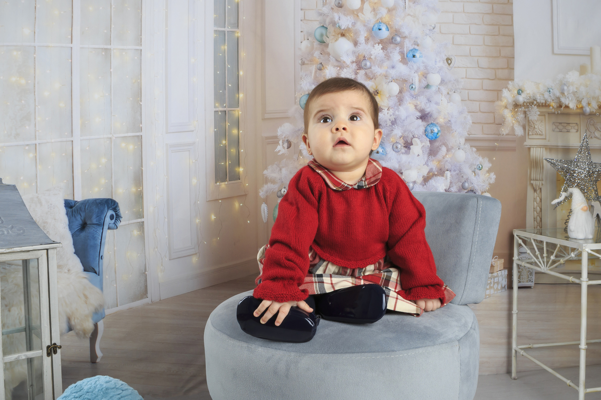 Menina na sessão fotográfica de Natal
