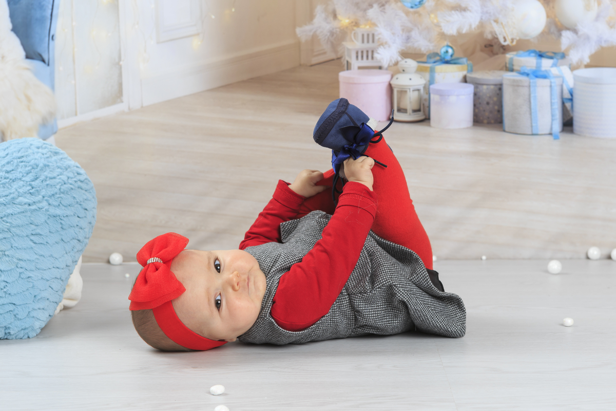 Pequena menina na sessão fotográfica 