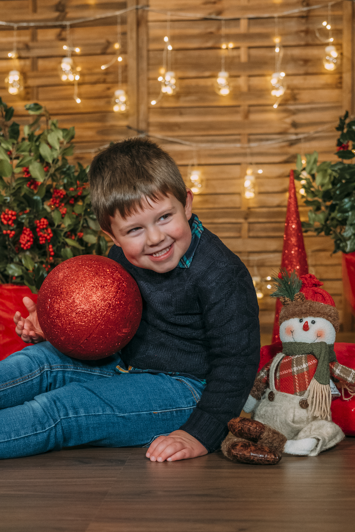 Menino na sessão de Natal