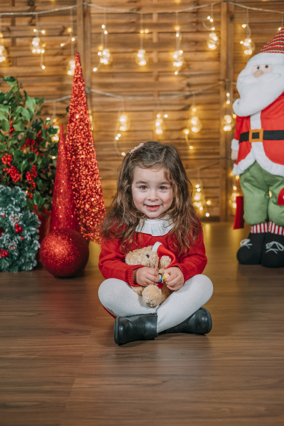 Menina na sessão de Natal
