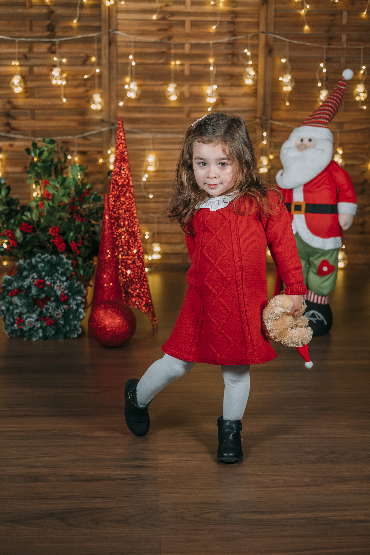 Menina na sessão fotográfica de Natal