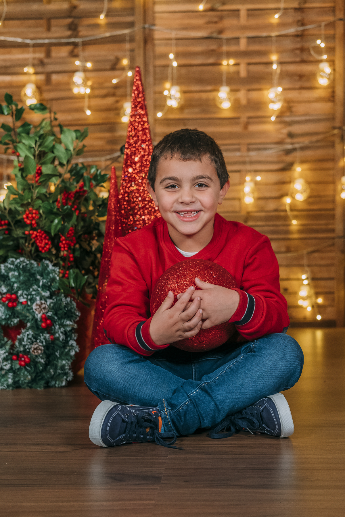 Menino na sessão de Natal