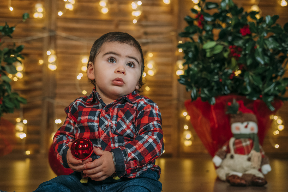 Menino na sessão de Natal