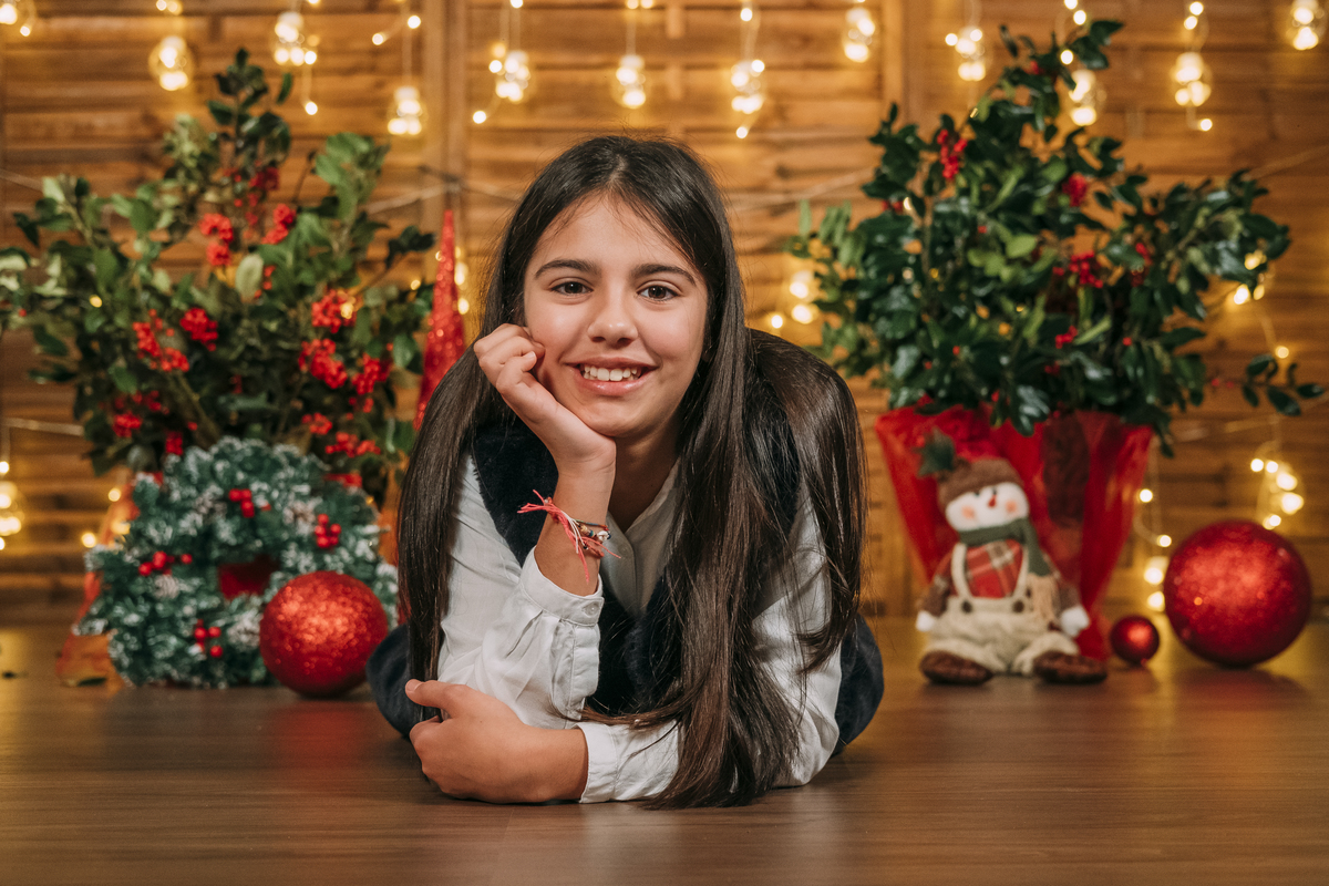 Menina na sessão de Natal