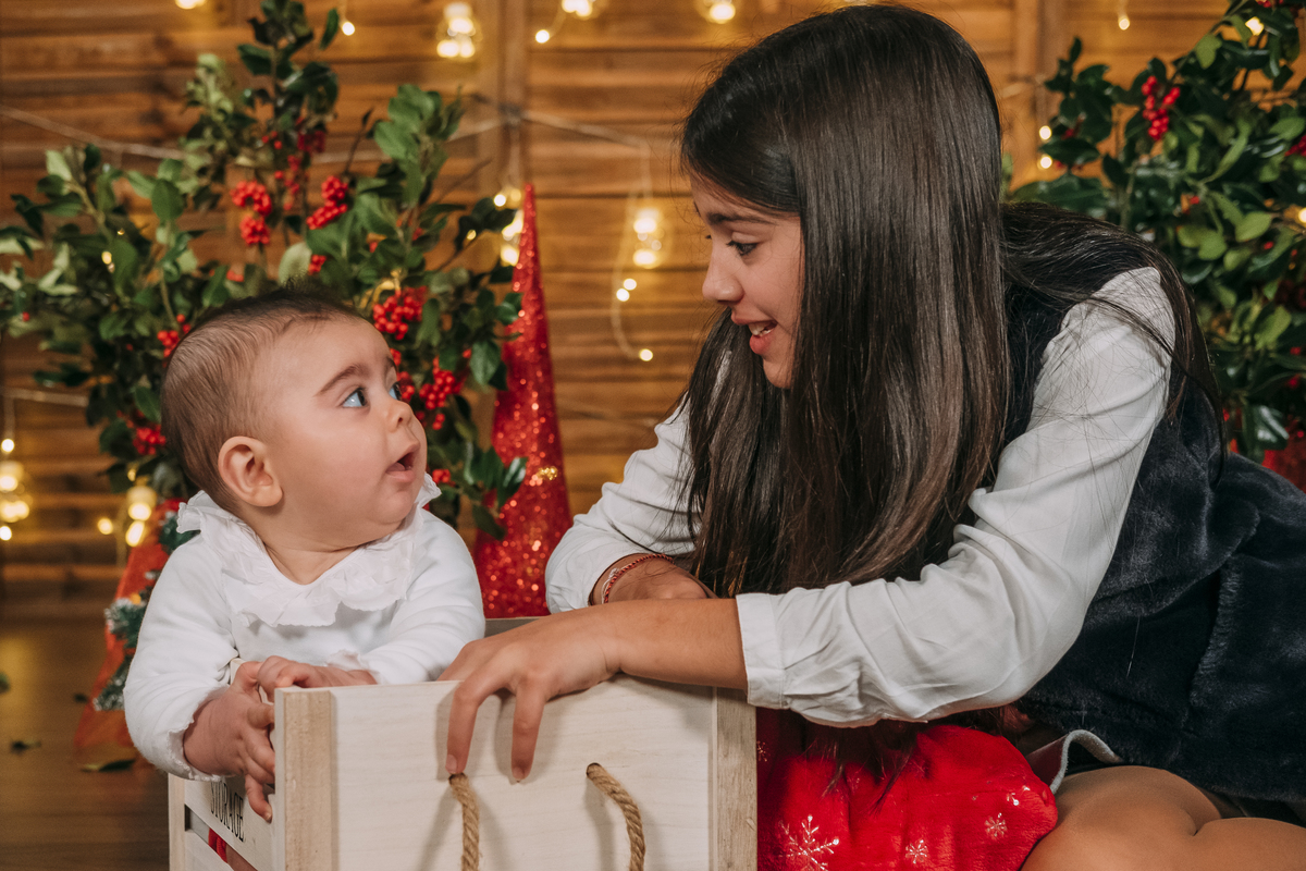 Irmãos na sessão de Natal na Foto David Marques