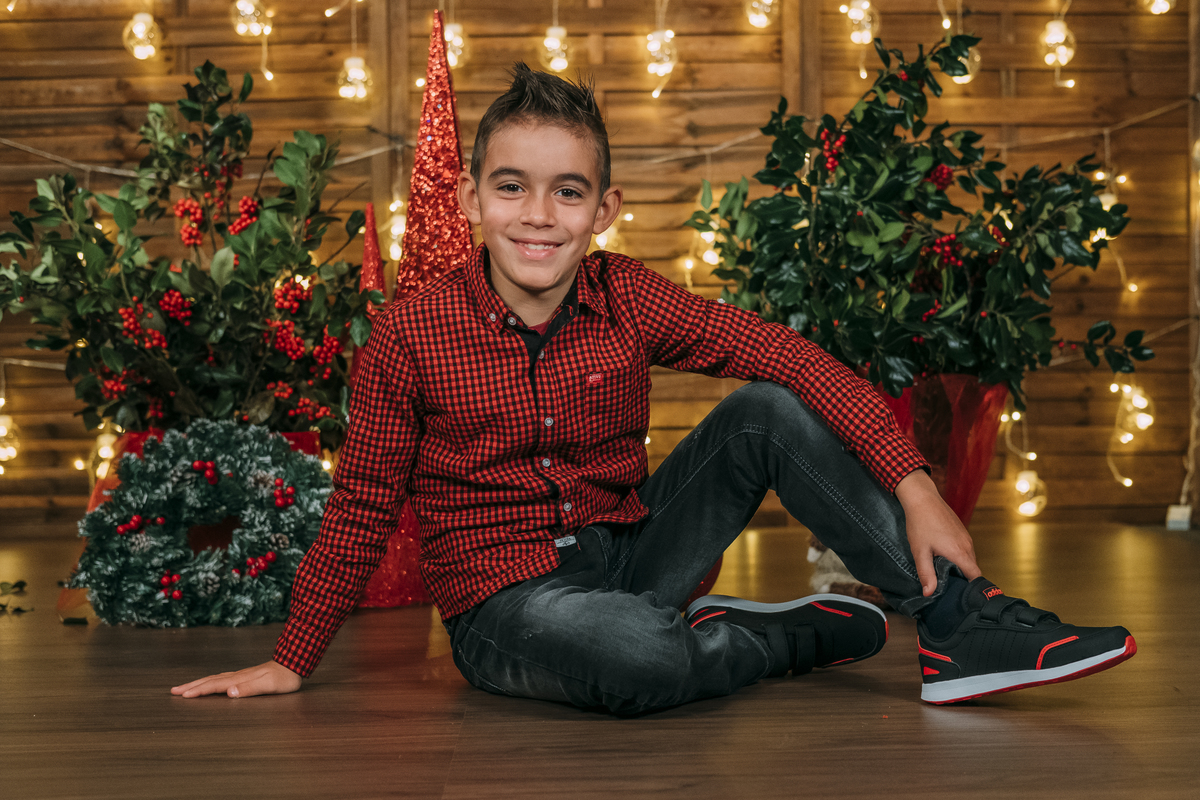 Menino na sessão de natal