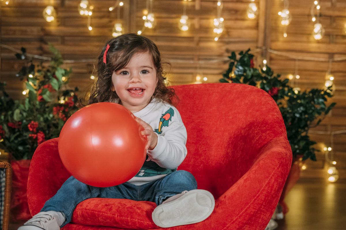 Menina na sessão de Natal