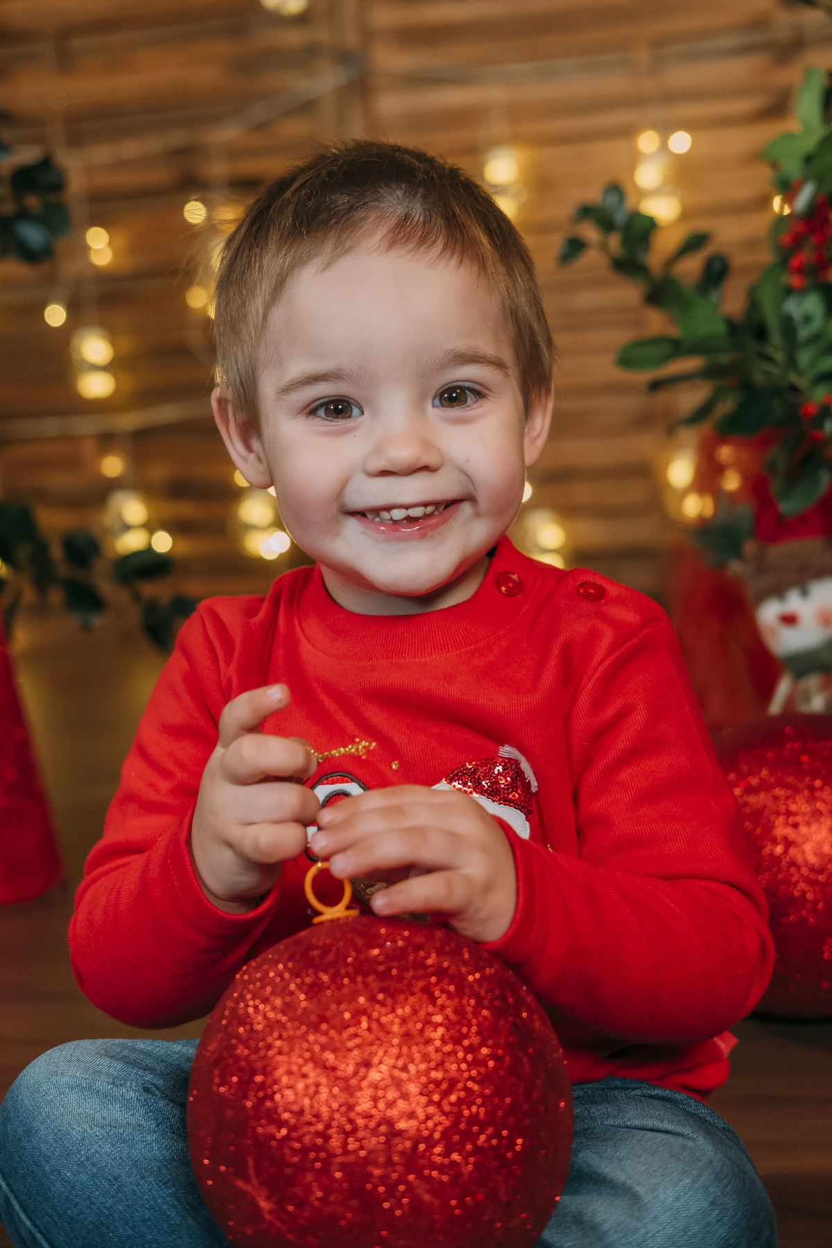 Menino na sessão de Natal