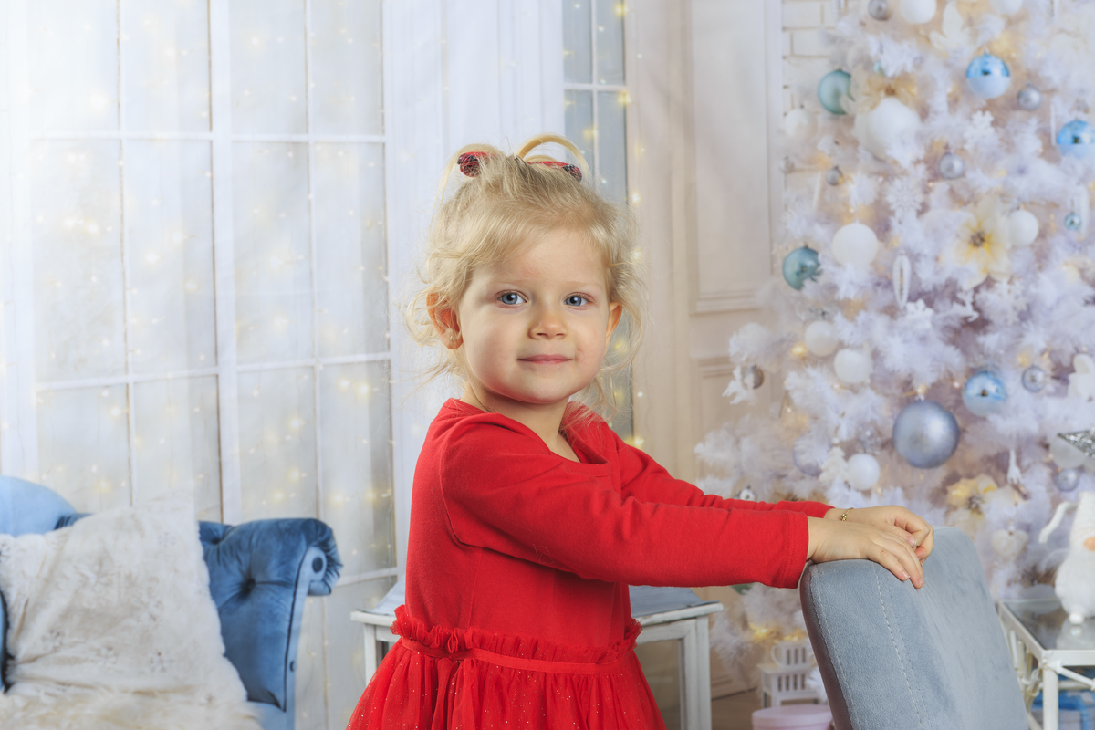 menina na sessão de natal