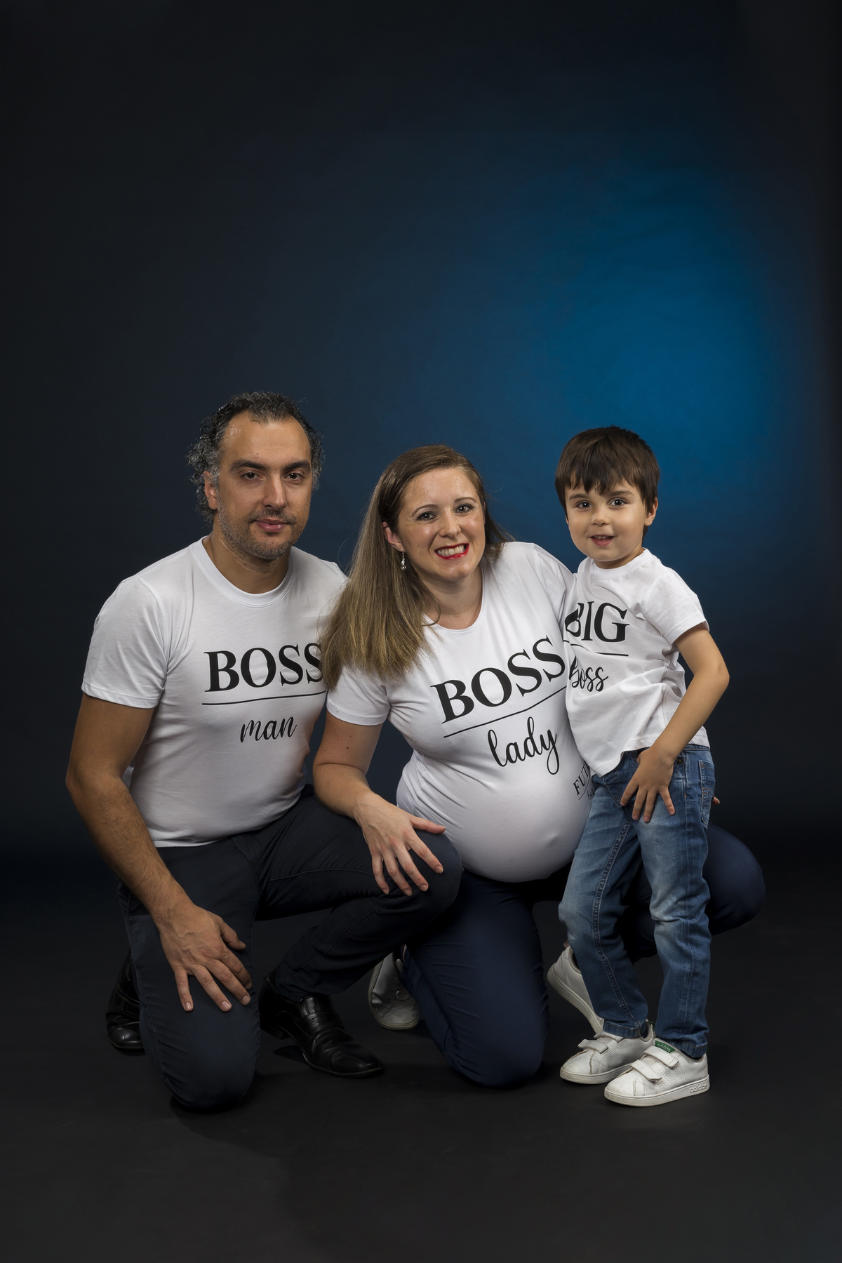família feliz na sessão fotográfica