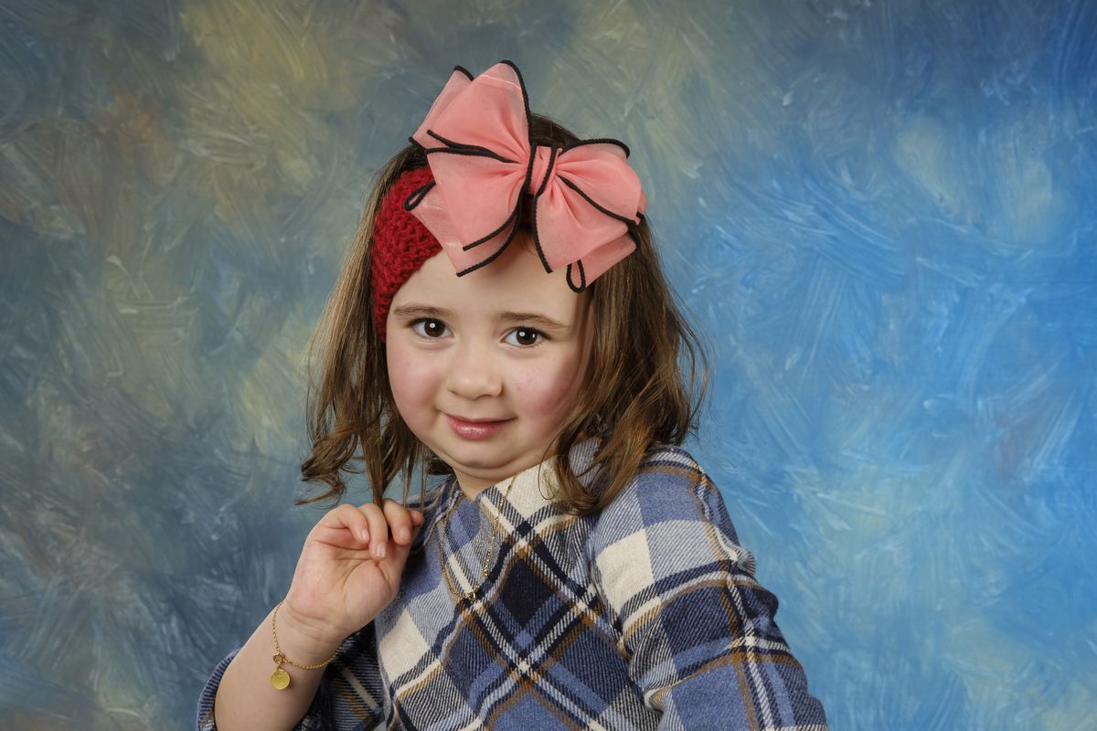 menina na sessão fotográfica de estúdio