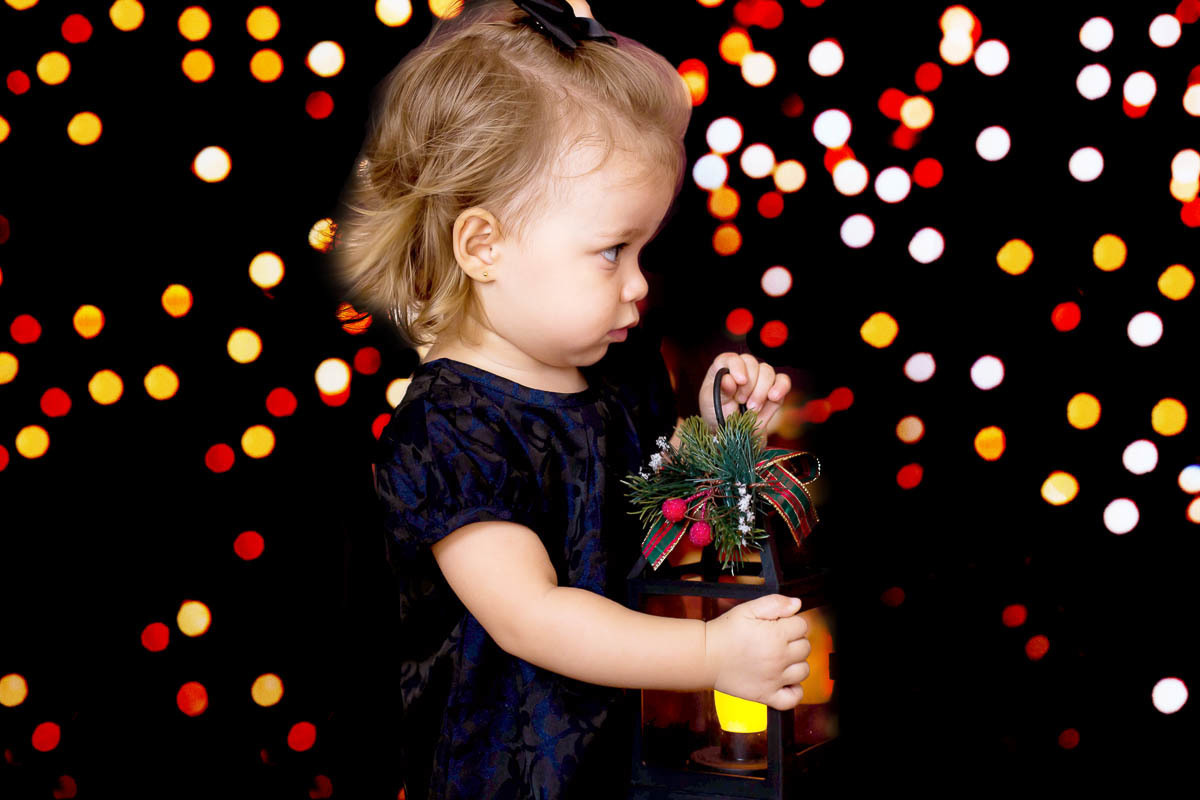 Ensaio de natal da Cecília de um aninho e 10 meses em Pará de Minas. Ensaio de Natal no cenário luzes.
