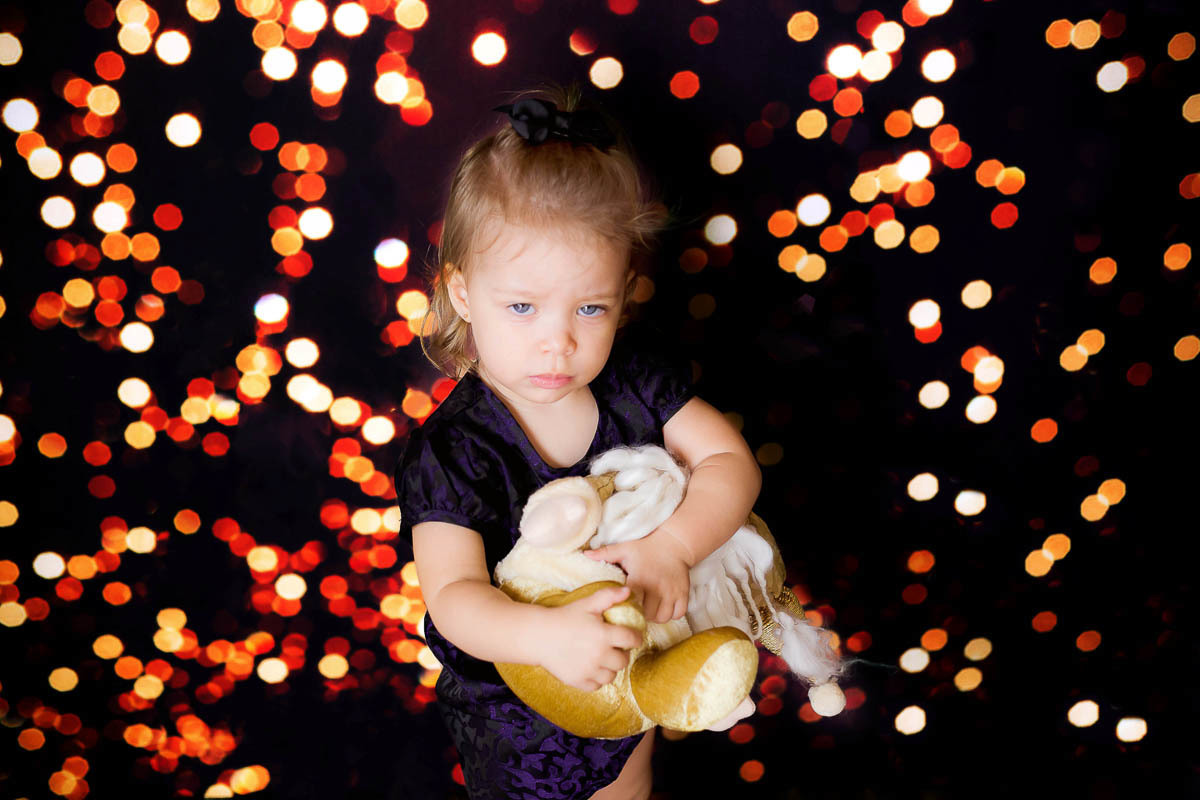 Mini ensaio de Natal em Pará de Minas no cenário luzes. Fotografia de natal 2020 da Cecília realizado em Pará de Minas.
