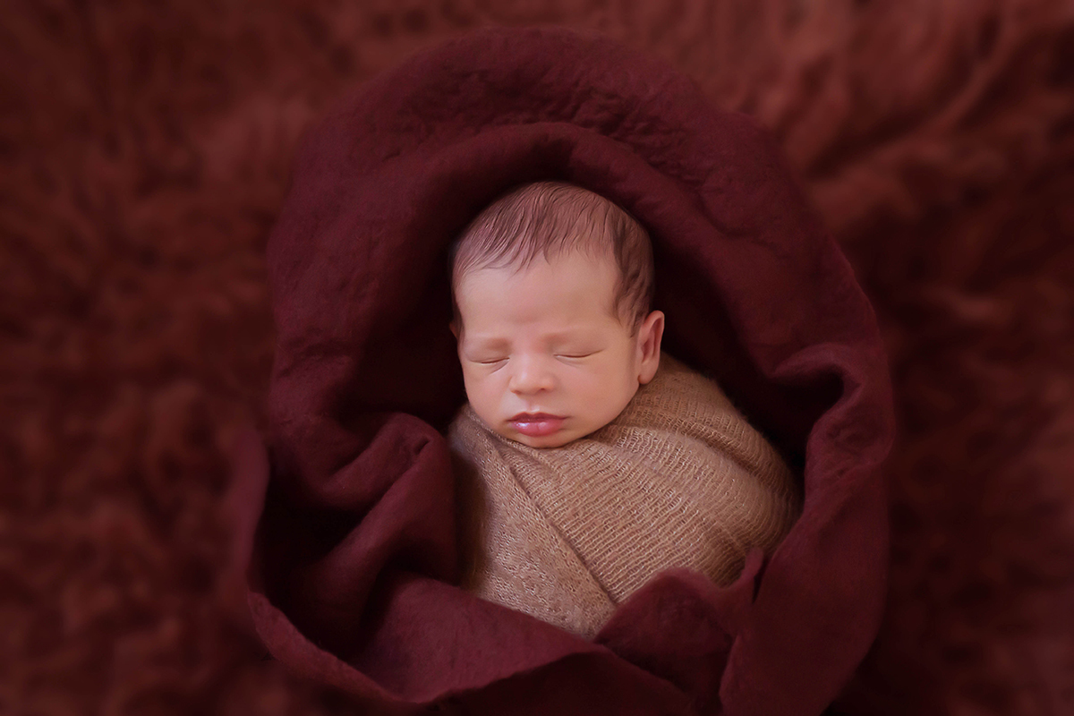 Fotografia de newborn do Miguel. Um bebê cheio de fofura de 9 dias. Ensaio realizado em Pará de Minas.
