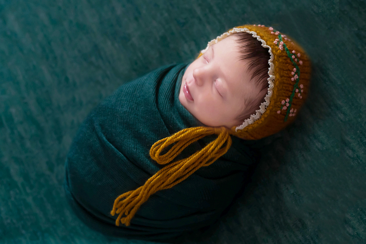 Fotografia da Maria Luísa de 19 dias em seu ensaio Newborn em Pará de Minas