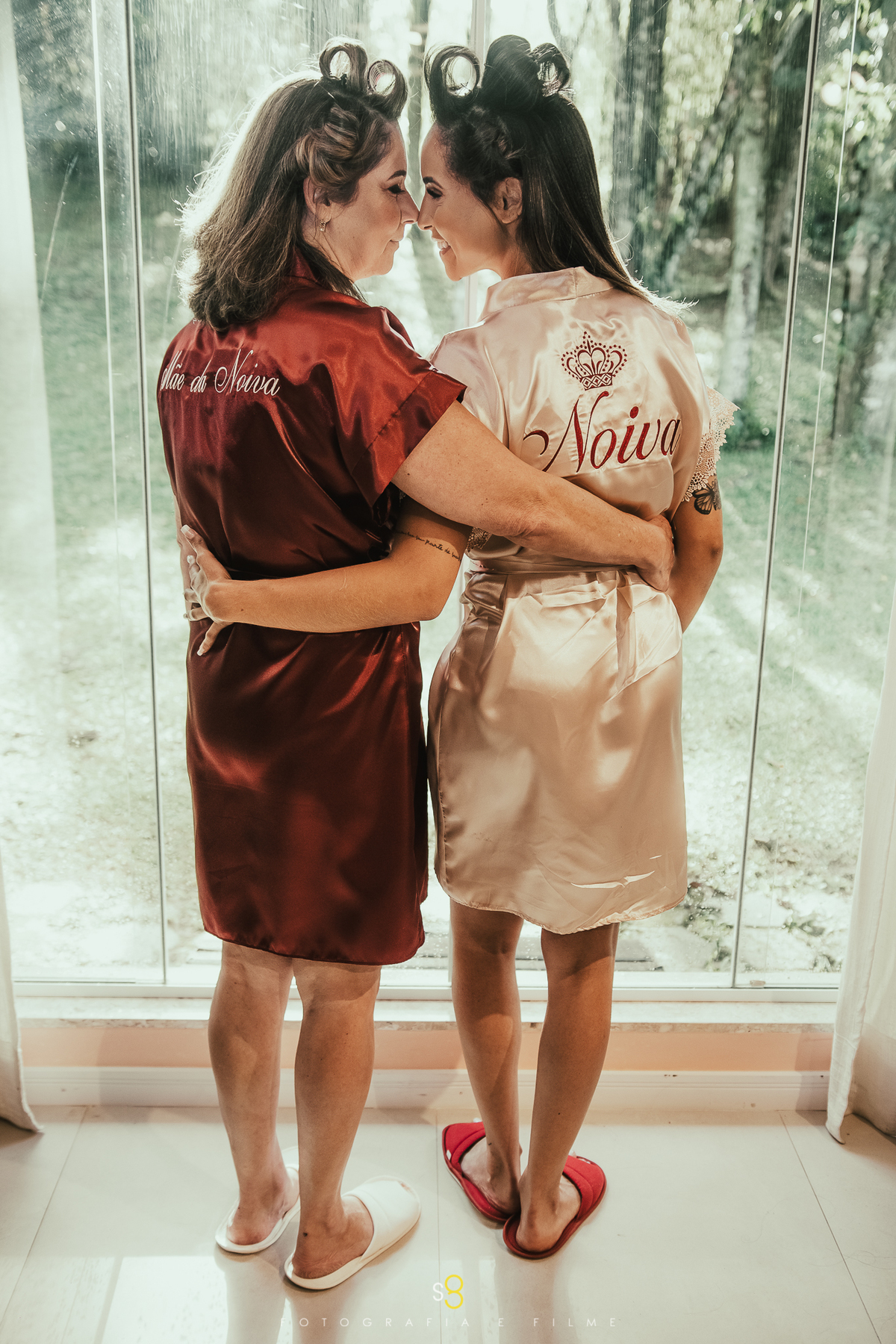 Fotografia de hobbie da noiva com a mãe no buffet callegaria espaço itália