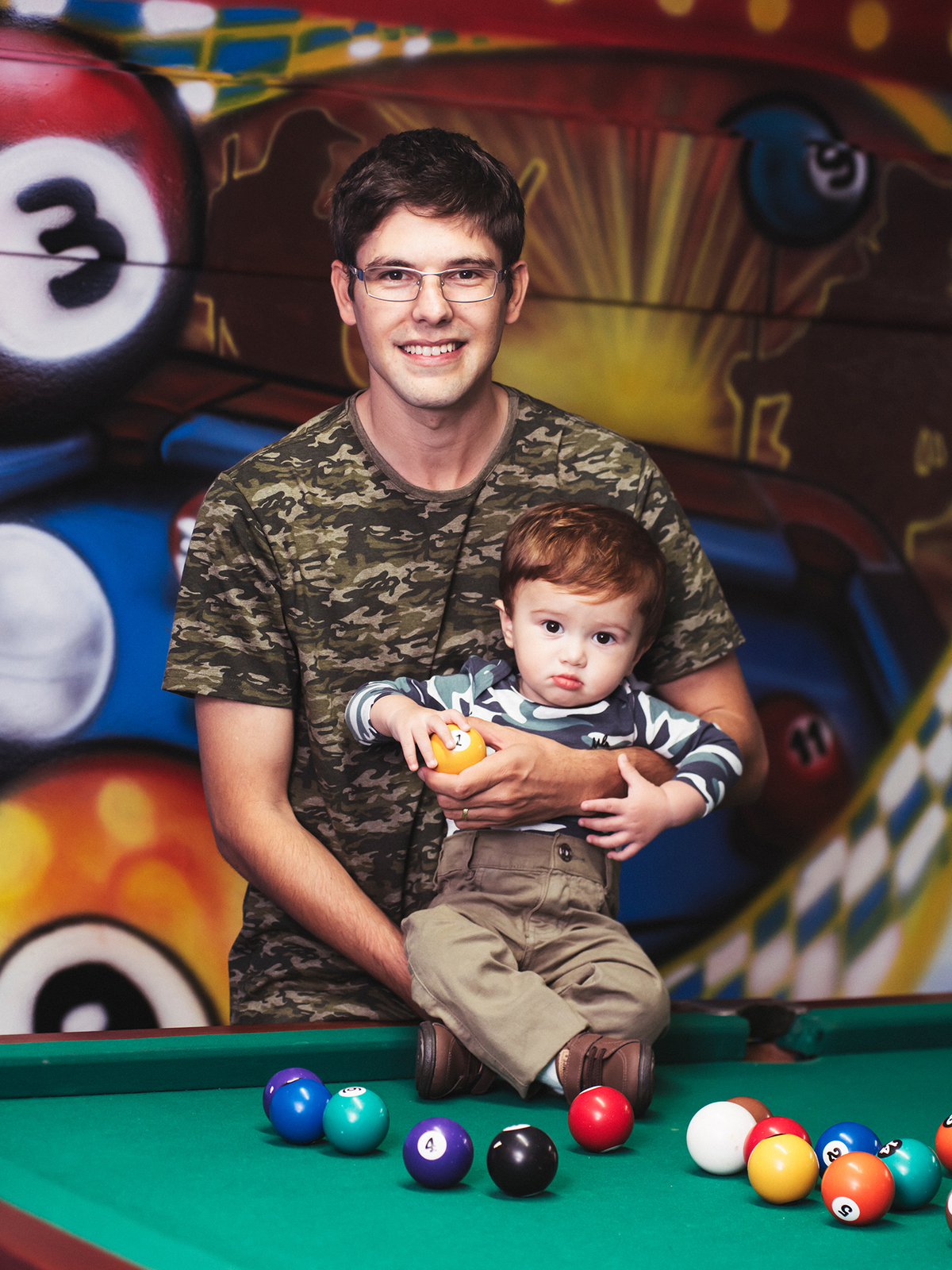 no colo do papai sendo fotografado pelo Marcio - Janousek Photos