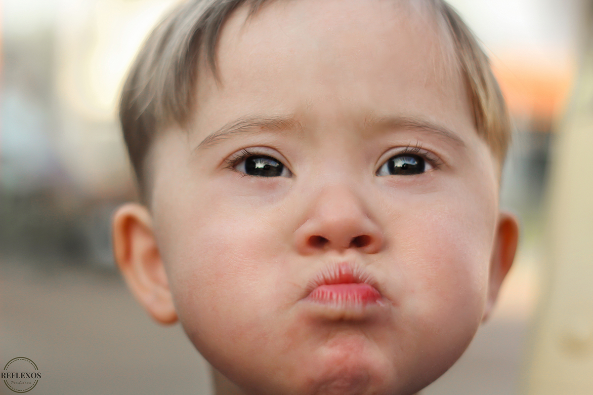 Ensaio fotográfico com criança portadora da Síndrome de Down