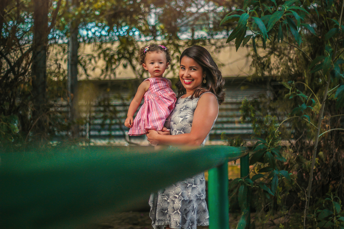 Fotografia de família: Dani, Rafa e Celina celebrando o amor e a união