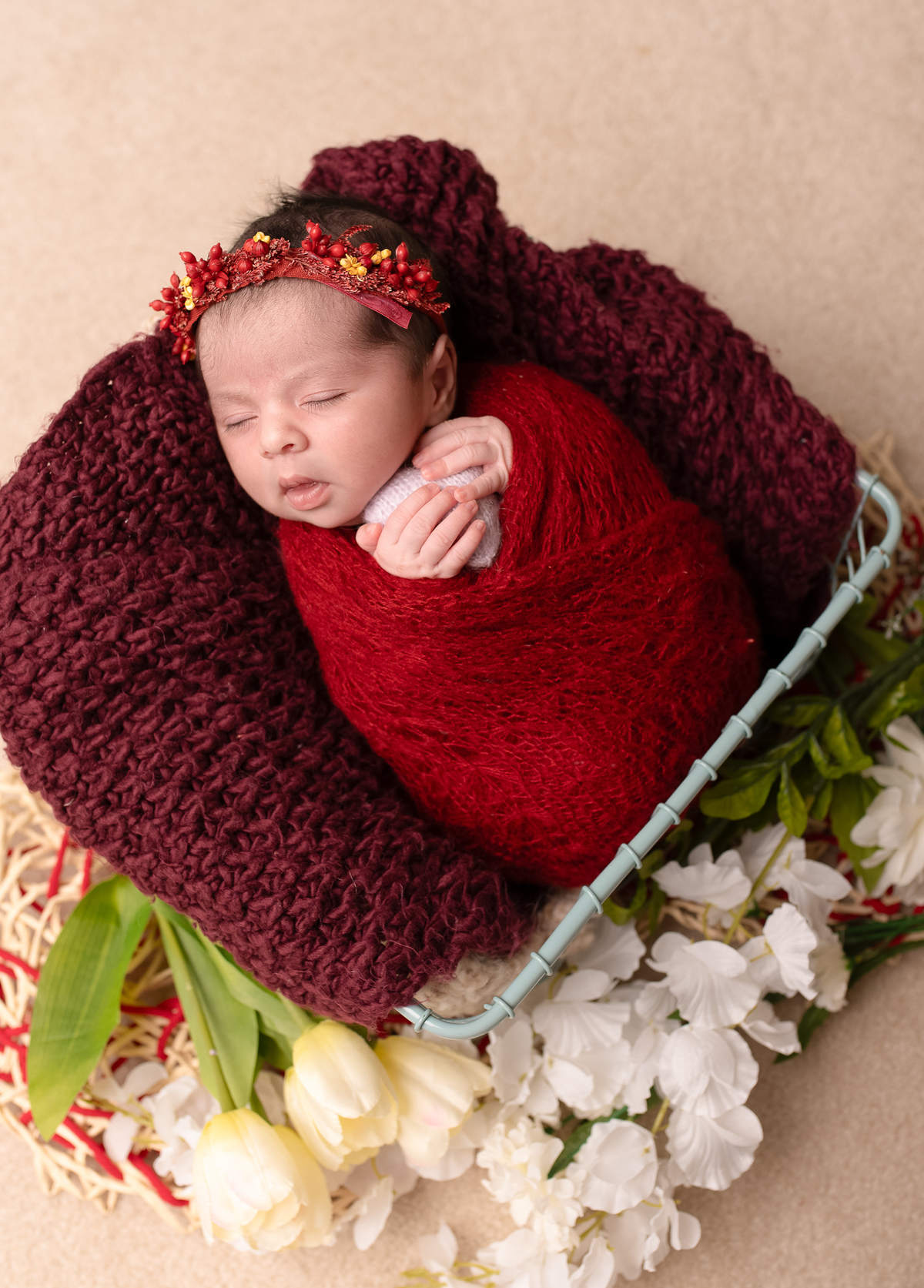 Newborn baby boy posed safely in father’s hands – Burnaby newborn photography studio