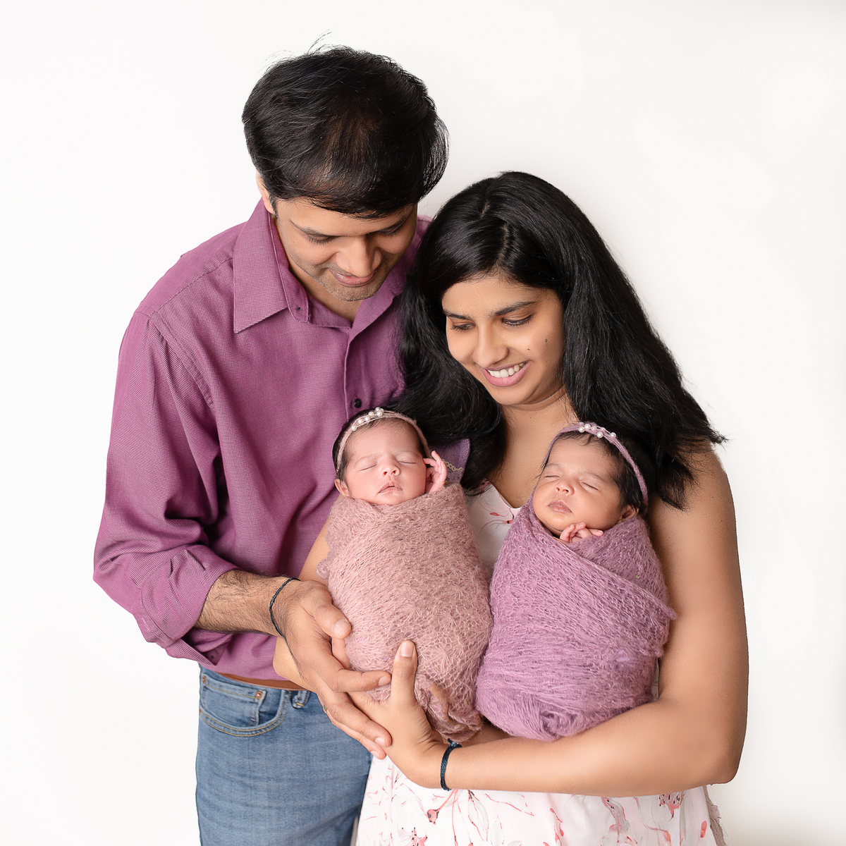 Sleeping newborn baby wrapped in neutral tones – professional newborn session in Vancouver