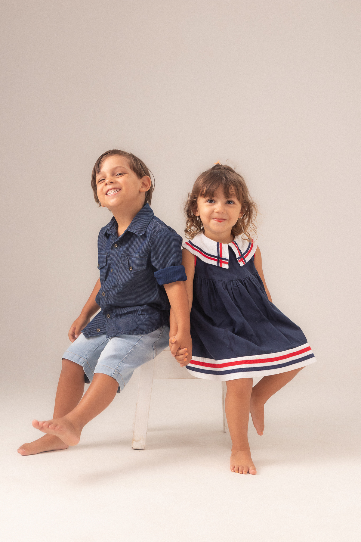 ensaio gestante estúdio belo horizonte barreiro contagem ibirite marcos felipe fotografia clean branco bege vermelho