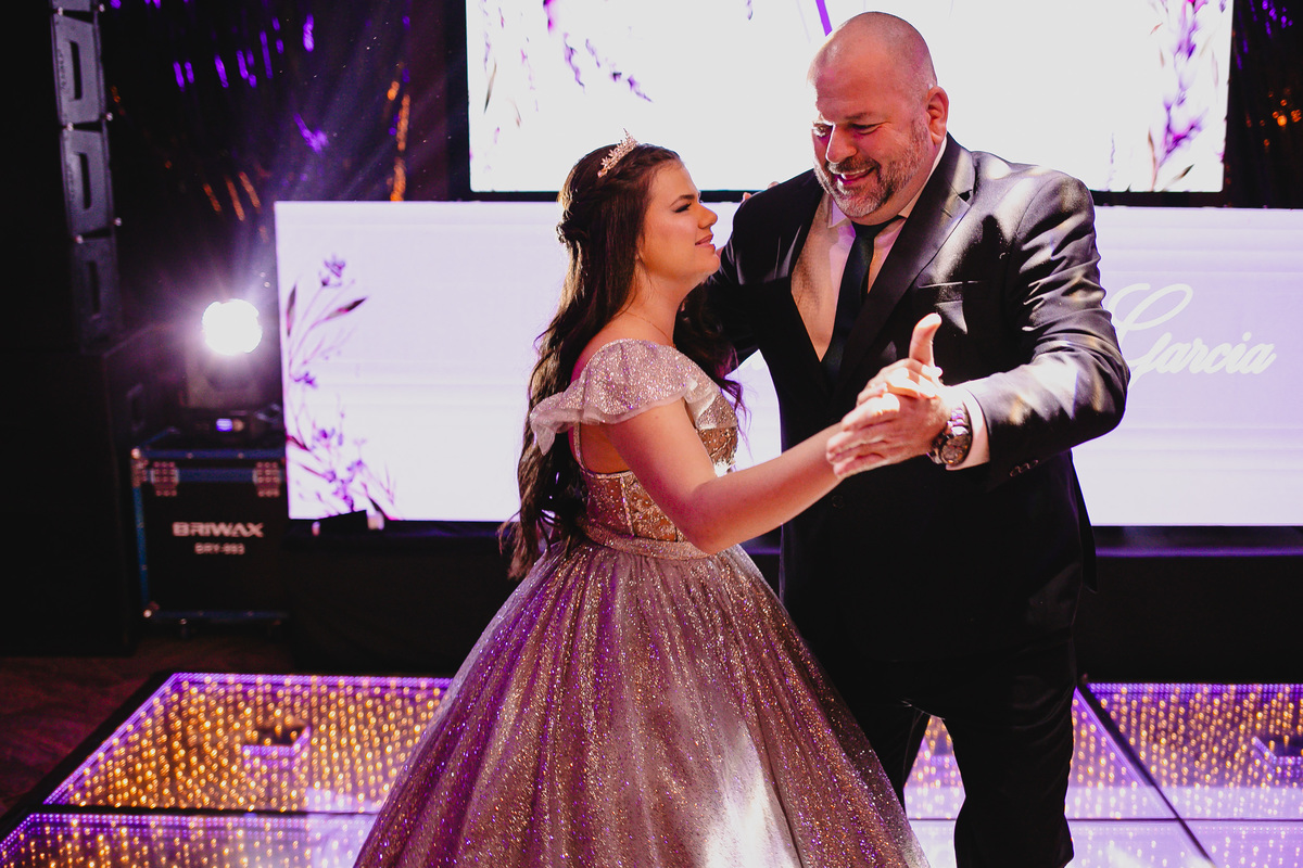 Fotografia de família em festa de debutante realizada na La Estancia.