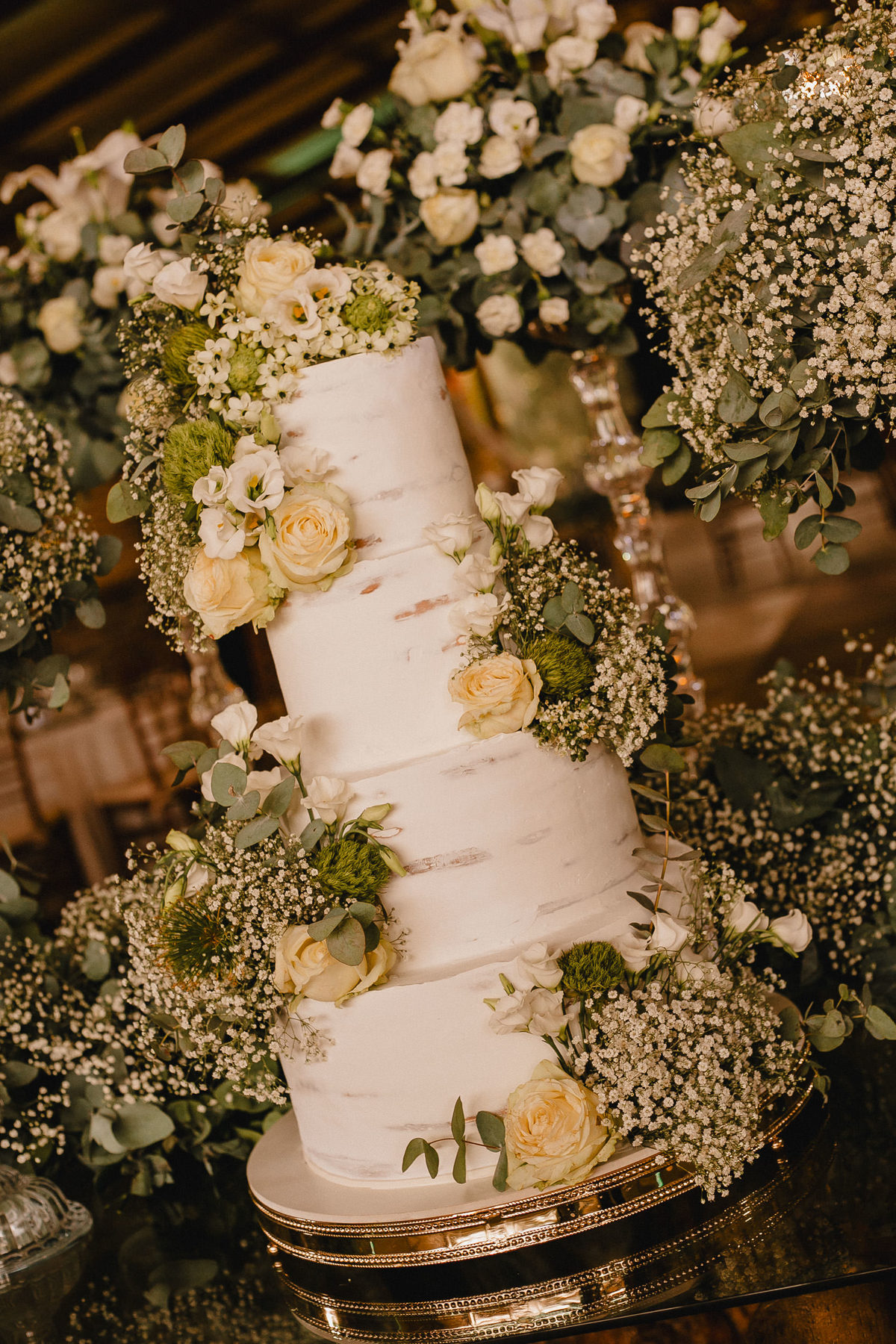 Decoração da cerimônia de casamento em espaço aberto na La Estancia valorizando a atmosfera romântica do evento.