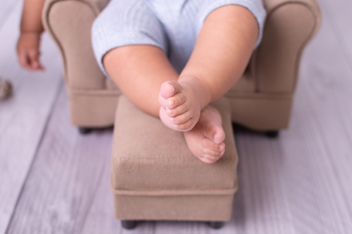 Book Acompanhamento infantil realizado em santo andré, mostrando os detalhes do bebê como os pezinhos