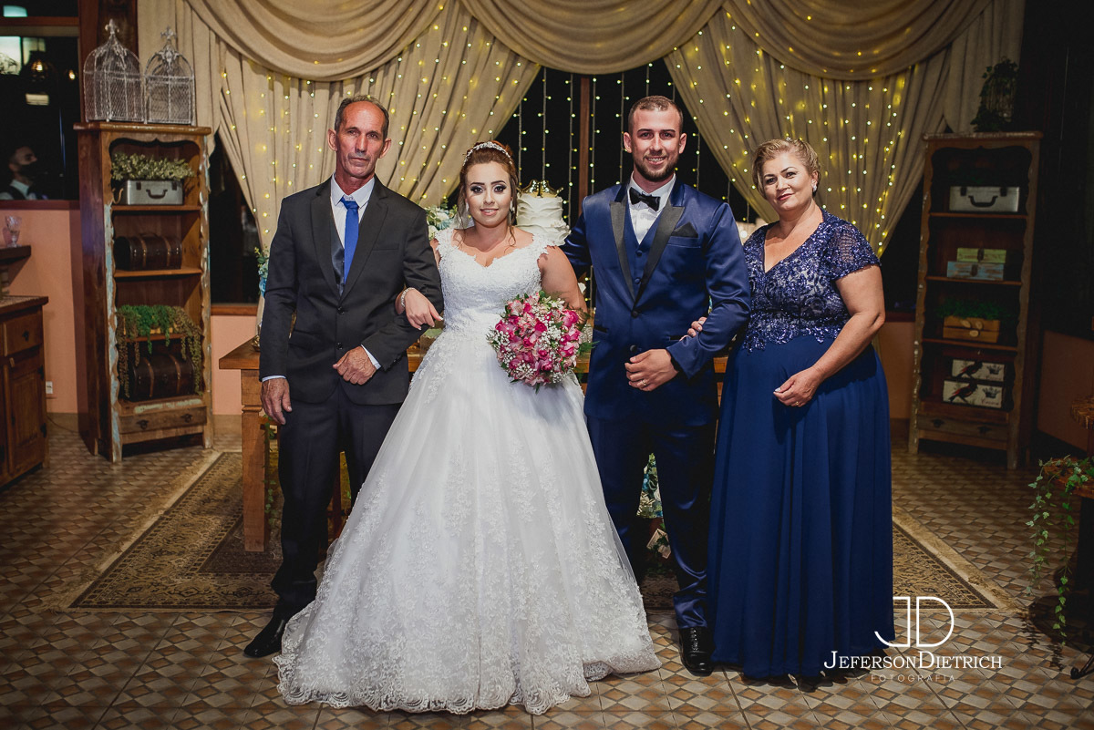 Fotografia com os pais do noivo