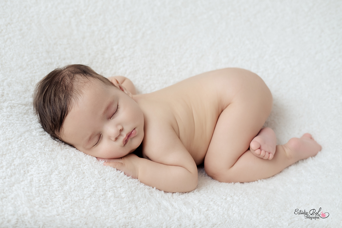 Este boneco em forma de pessoinha é o Pedro com 5 meses