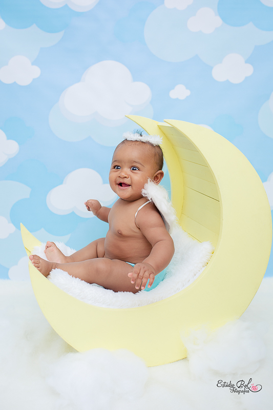 Essa lua com esse anjinho esta muito lindo